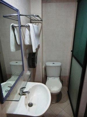 Amrise Hotel Сингапур Номер фото